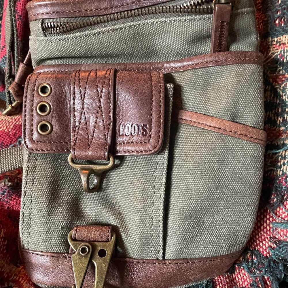 Roots canvas/leather crossbody bag. Great for a day out to carry what is needed.